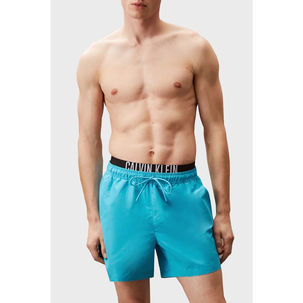Calvin Klein Regular Fit Logolu Mayo Short KM0KM01093CVJ Erkek Mayo Short KM0KM01093 Cvj Erkek Plaj Giyimi Fiyatı