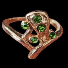 Costume jewellery gold coloured metal ring green diamante size 19 Coloured Stone Ring price
