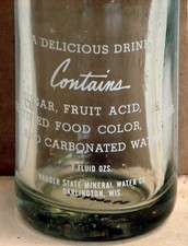 Badger State Mineral Water Co.; Darlington, WI; Embossed and ACL soda pop bottle Mineral Water and Soda price