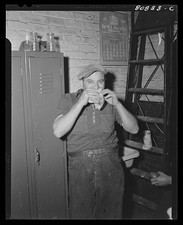 Photo:Factory Worker Drinking from Bottle 1930s Locker Room Stairway Worker Lockers price