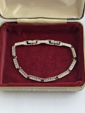 Pulsera Swarovski Tenis Enlazada Tono Plata Firmada y Logo Cisne 20cm Swarovski Bracelet price