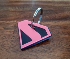 Supergirl Superman Nuevo Estilo Emblema Llavero Llavero Alternativo Rosa/Negro Keychain price
