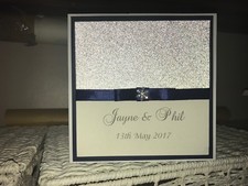 Invitación de boda - Cinta azul marino con tarjeta plateada brillante y copo de nieve de diamante Davetiye price