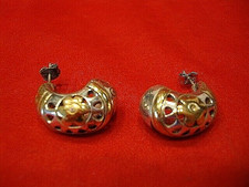 Pendientes perforados y pequeñas piedras transparentes para mujer en tono plateado con detalles de color dorado Colored Stone Pendientes price
