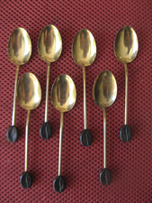 "633.18"    7 CUILLERES A MOKA EN METAL DORE ET EMBOUT GRAIN DE CAFE Café price