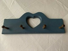 Wood wall hanging with heart-shaped cutout and pegs Wooden mur Art price