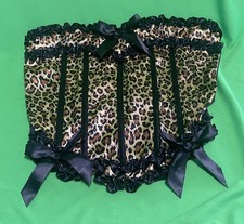 corset bustier imprimé léopard, décoré de volants noirs et de rubans satinés. Co Corset price