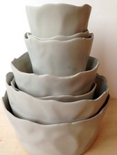 Set of 7 Grey/ taupe contemporary sculptural ceramic nesting ruffled cachepots Nesting tables price