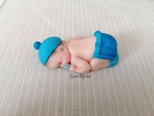 Bomboniera sacchettino bebè bimbo con pannolino e cappello azzurro Pannolino bebè price