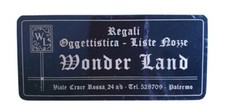 Adesivo vintage del negozio di articoli da regalo WONDERLAND di Palermo Articoli regalo price