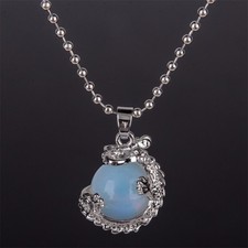 COLLANA CON CIONDOLO PIETRA COLORE CELESTE AVVOLTA DA DRAGO. BELLA (Cod. 23) Collana con pietre colorate price