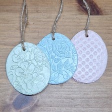 3 x embossed clay Easter egg decorations. Pastel door drawer hanging ornaments Baby Door Ornament price