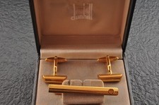 Near mint "Dunhill" Cylindrical cufflinks and tie clip gold color, brand case. Manchetknopen price