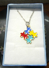 autism necklace multi colour enamelled puzzle piece ,making people aware Coloured Stone Necklace price
