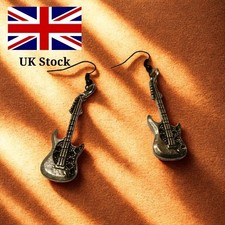 Silver coloured guitsr shaped earrings Coloured Stone Earrings price