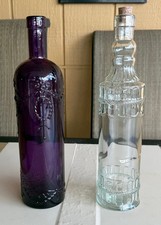 2 OF DECORATIVE GLASS BOTTLES PURPLE AND CLEAR 12" TALL Decorative Bottle price