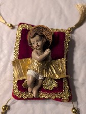 Baby Jesus On Soft Red Pillow With Gold Accents 4x5.5 In Baby Gold Pillow price
