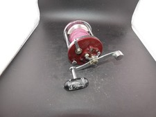 FISHING REEL PENN JIG-MASTER  NO 500  RED  SIDE PLATES  WORKING  FREE SHIPPING Fishing Reel (Jig) price