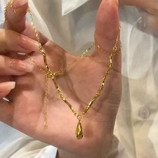 Women's Irregular Ripple Teardrop Necklace Fashion Pendant Necklace Copper Costume Necklace price