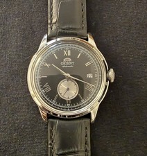 Orient Bambino Automatic Black Dial Roman Numerals Date Black Leather Box Wristwatches price
