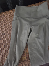 Athleta Salutation Stash Pocket II Cutout 7/8 High Rise Leggings Green S Leggings price