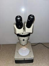 Olympus VMZ Stereoscopic Microscope 1x-4x w/ Illuminator Base Microscope price