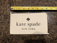 kate spade new york Beige Zip Wristlet Pouch Logo Wrist Strap Silver Clutch Bag price