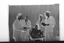(1) B&W Press Photo Negative Men Around Woman at Desk Papers Books Suits - T5053 Photo Papers & Acetates price
