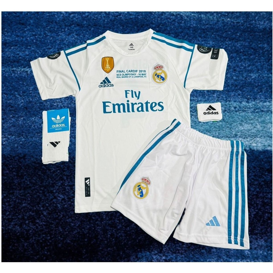 Sidas Real Madrid Cristiano Ronaldo Beyaz 2018 Sezon Şampiyonlar Ligi Çocuk Forma Takımı 4 Parça Forma +Şort +Çorap + Bileklik Hediye Giyim & İç Giyim Fiyatı